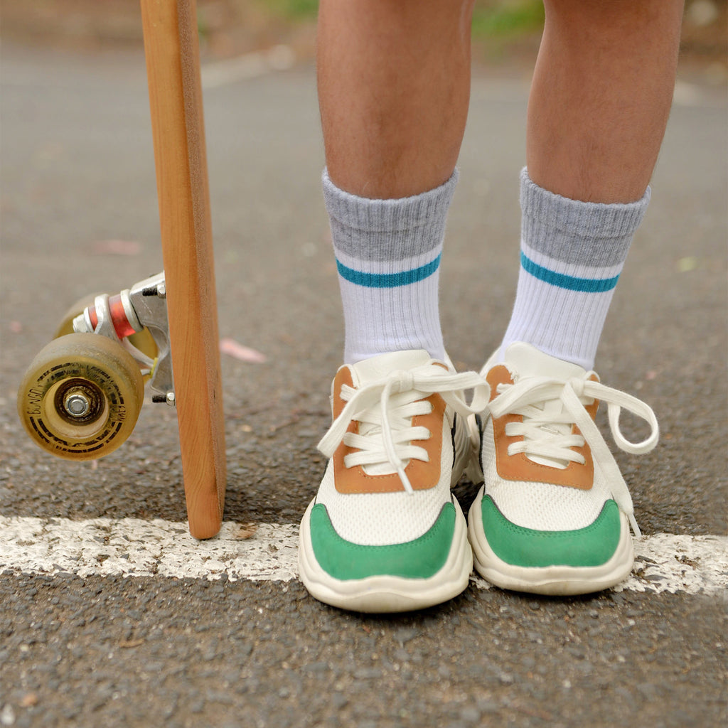Posisocks boy wearing giggle socks